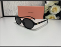 Miu Miu Style Oval Sunglasses — Black